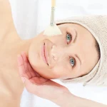 Woman with radiant skin after chemical peel for pimple marks